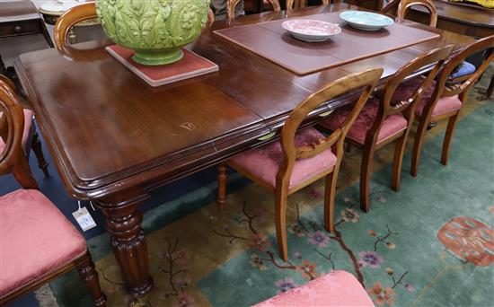 A Victorian mahogany extending dining table W.240cm